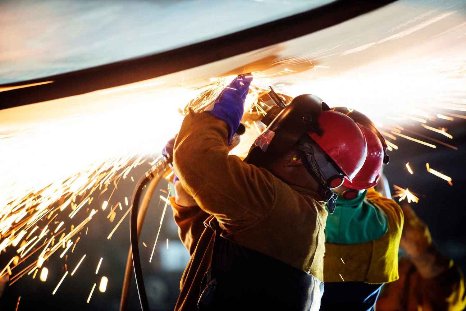 Two technicians welding