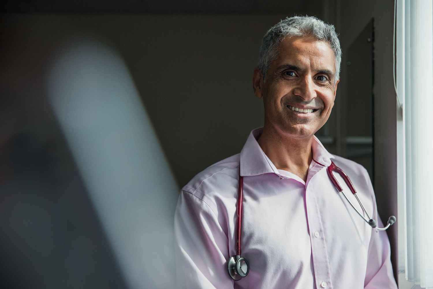 Smiling doctor with stethoscope