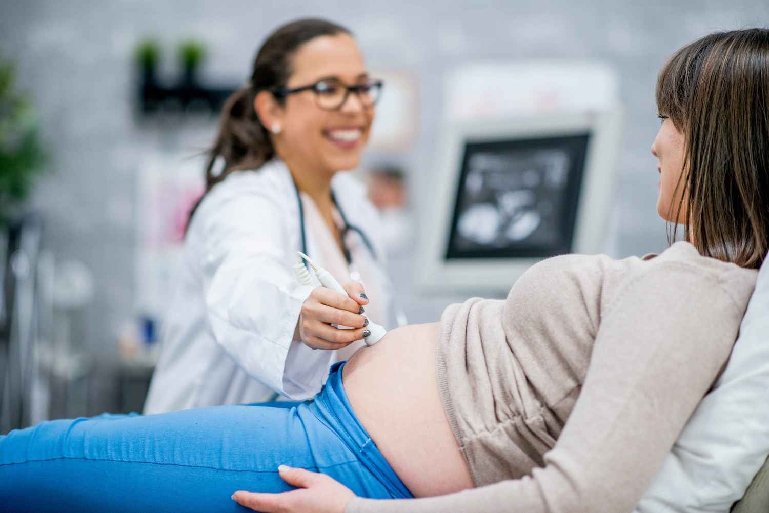 Pregnant woman receiving an ultrasound