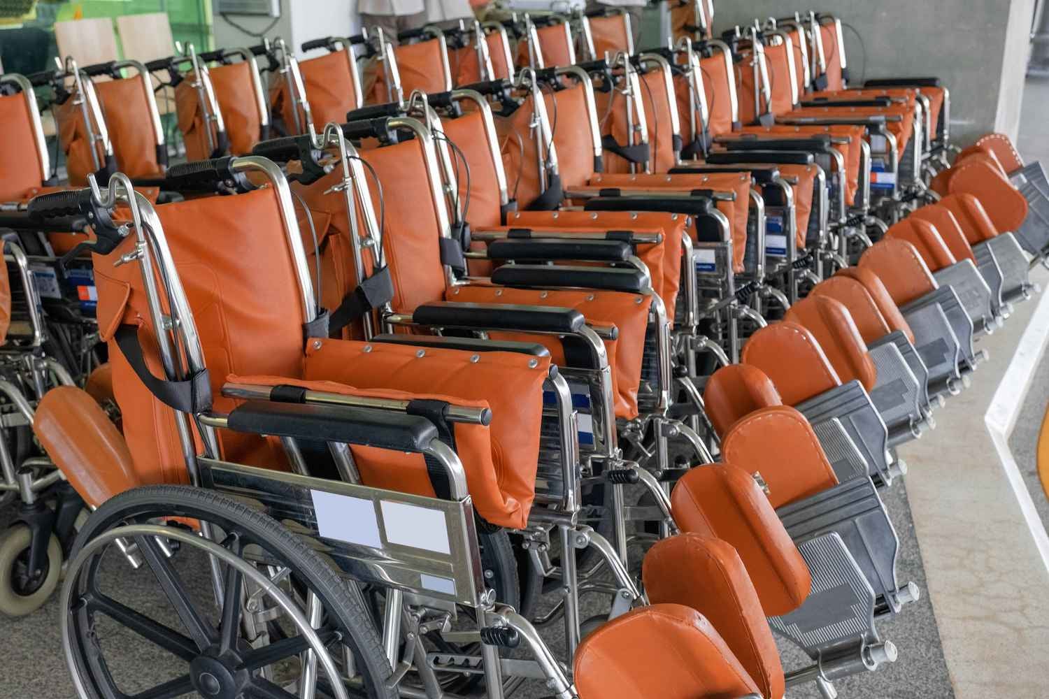 Row of wheelchairs in a medical setting