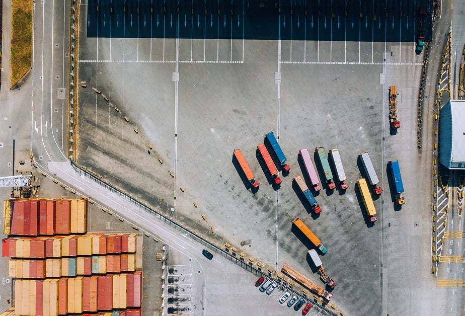 Several transport vehicles generating carbon emissions