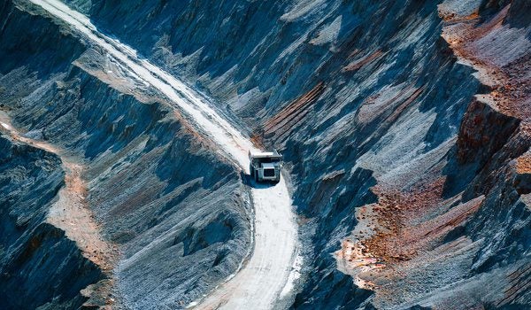 A truck moving minerals from a mine.